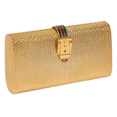 gucci gold clutch vintage|old style vintage gucci bag.